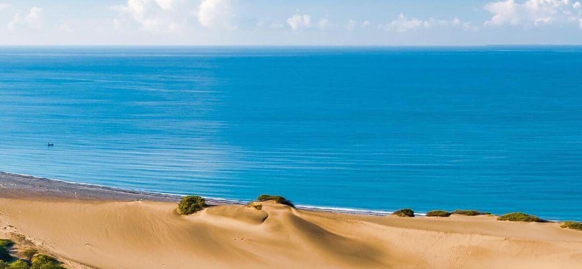 Dunas De Baní is a national park with dunes of sand between the road and the ocean Photo Credit GoDomRepublic via Facebook