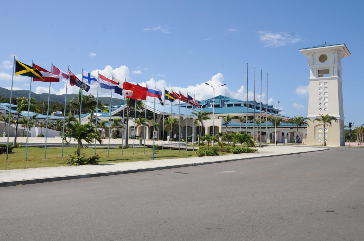 Entrance of the Montego Bay Convention Centre in Jamaica. Displaying flags of many countries. 